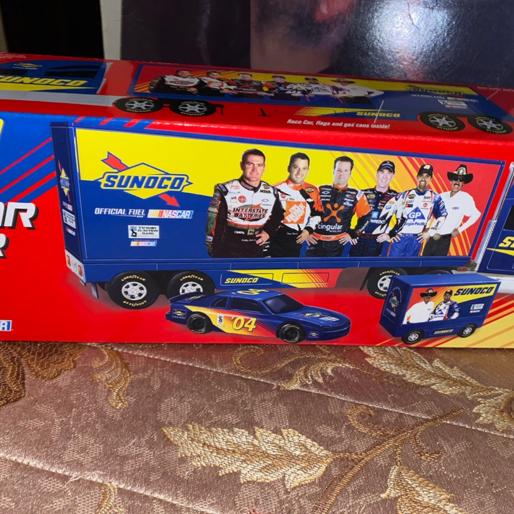 Blue and Red Toy Racing Truck Set